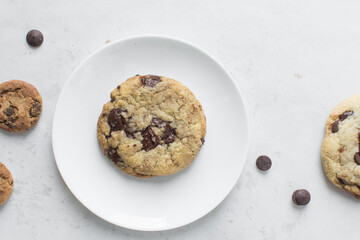 Overhead view of chocolate chip cookies, top view of homemade chocolate chip cookies on a white background