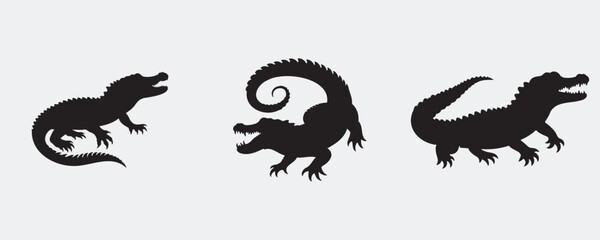 Silhouettes of three alligators in various dynamic poses with open jaws and textured bodies, isolated on a light background
