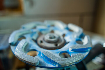 Blue concrete grinding attachment close-up