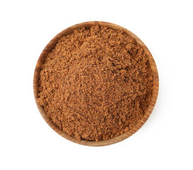 Superfood. Nutmeg powder in bowl isolated on white, top view