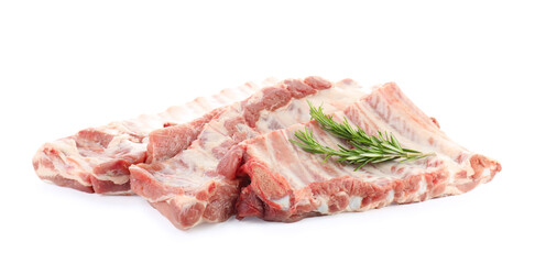 Fresh raw pork ribs and rosemary isolated on white