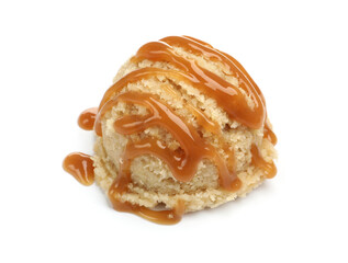 One scoop of delicious ice cream with caramel sauce isolated on white
