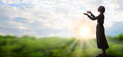 Young girl praying to God