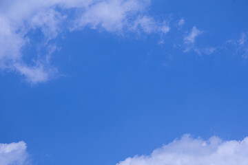 Fluffy Clouds Against a Vibrant Blue Sky
