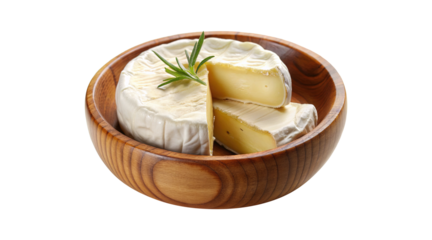 Delicious wheel of soft brie cheese presented beautifully in a wooden bowl