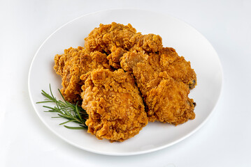 Crispy fried chicken in a white plate