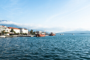 Scenic View of Tivat Montenegro Waterfront with Boats and Mountains – Adriatic Sea Coastline and Bay of Kotor Seaside Town Landscape for publication, poster, calendar, post. High quality photography