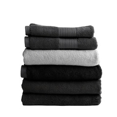 A stack of folded towels in shades of gray and black on black surface