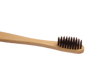 Eco-friendly bamboo toothbrush with black bristles, designed for sustainable oral care. A biodegradable and plastic-free alternative for an eco-conscious lifestyle