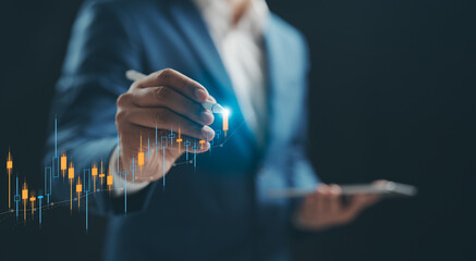 Business financial stock market concept. A Businessman analyzing graph financial data stock market. Business finance stock bar chart Hologram. Business success and growth, economic growth graph.