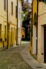 The narrow streets of the city of Ferrara (Emilia Romagna, Italy)