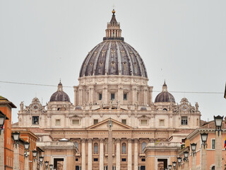 Obraz premium Vatican City. Vatican City, a city-state located within Rome, Italy, is the headquarters of the Roman Catholic Church. It is the home of the Pope and a treasure trove of iconic architecture and art.