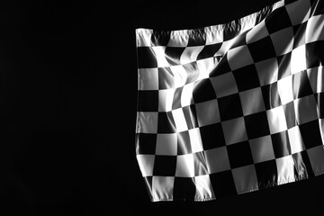 One racing checkered flag on black background, space for text