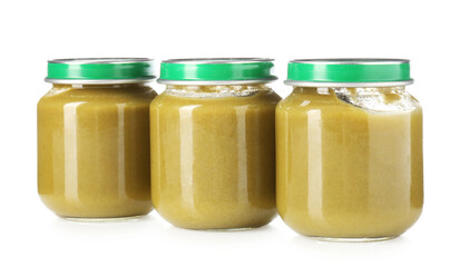 Baby food. Tasty puree in glass jars isolated on white