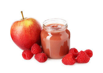Baby food. Tasty puree in glass jar, fresh apple and raspberries isolated on white