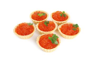 Tartlets with red caviar and parsley isolated on white