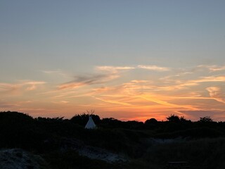 sunset over the tent