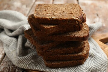 Pieces of fresh bread on table, closeup