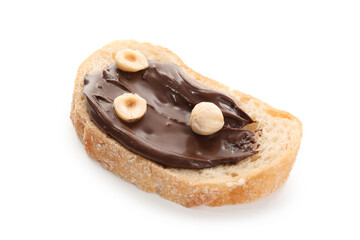 One slice of bread with chocolate spread and hazelnuts isolated on white