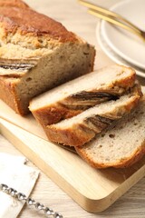 Pieces of banana bread on wooden table, closeup