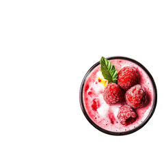 Top view of a raspberry smoothie with mint in a glass on black background