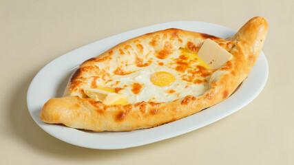 Georgian Adjarian khachapuri on plate isolated 