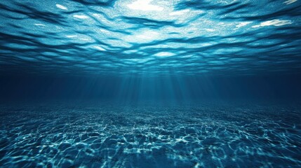 Obraz premium Deep ocean floor illuminated by sunlight.