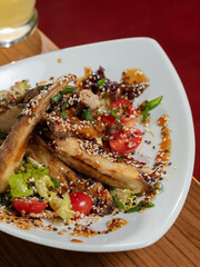 Crusty eggplant salad bowl top view