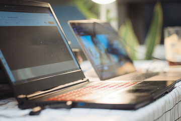 Laptop on white table . Home interior or office background