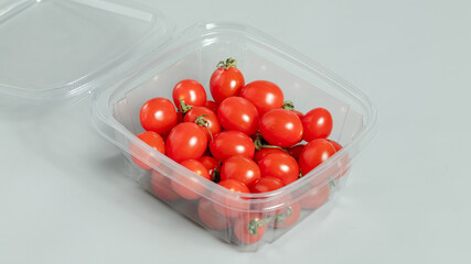 Cherry tomatoes in plastic box