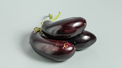 Eggplants isolated on grey background