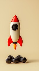 Fototapeta premium Whical small rocket toy with red and white body orange flame fins and black circular window flying over black stones on beige background