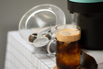 Capsule coffee machine with espresso cup. Nespresso is worldwide leader company with coffee