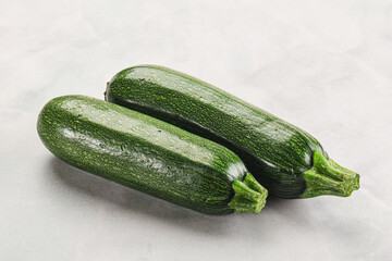 Raw green ripe zucchini vegetable