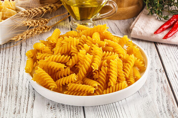 Italian dry pasta Fussili for bowl