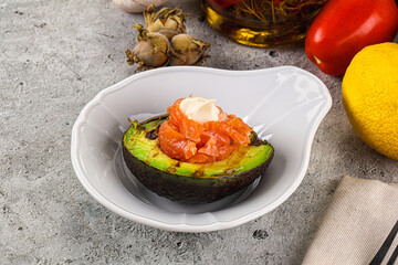 Whole grilled avocado with salmon