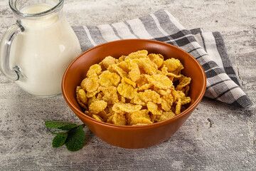 Corn flakes with milk for breakfast