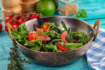 Salad with salmon and arugula
