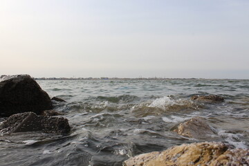 rocks and waver on the beach footage of the city of dammam in Corniche, located in eastern Saudi Arabia on the Arabian Gulf