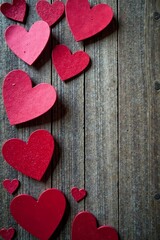 Fototapeta premium Wooden background with heart-shaped valentines in various sizes and colors, hearts, decoration, love