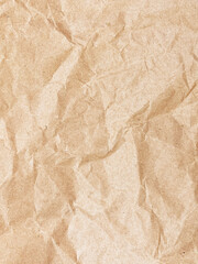 Closeup of a crumpled brown paper texture background