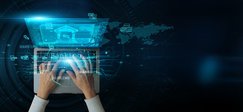 Man using a laptop with Banking on the keyboard, analyzing and developing various information about digital payments, customer service, financial technology, loan processing, and secure transactions.
