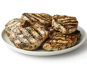 Plate of grilled pork chops with herb seasoning