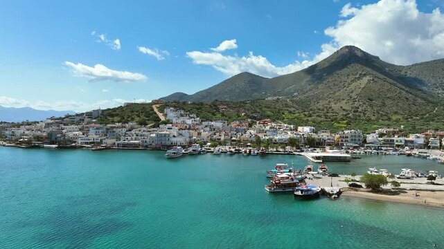 Schisma Elounda coastal town skyline and landscape in northern Crete, Aerial view
