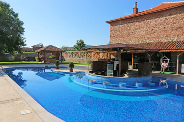 Outdoor swimming pool in summer