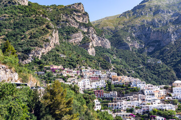 Naklejka premium The Amalfi Coast is the southern coast of the Italian Portofino Peninsula, part of the Campania region. View of the village on the shore cliff near the coast Mediterranean Sea.