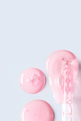 pipette drop of serum test on a light blue background