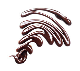 Pattern drawn with melted chocolate close up isolated on white background