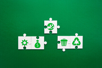 Global Sustainability Framework Puzzle Concept. Connected puzzle pieces displaying green...