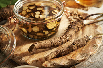 Preparation of burdock root tincture. Herbal medicine.